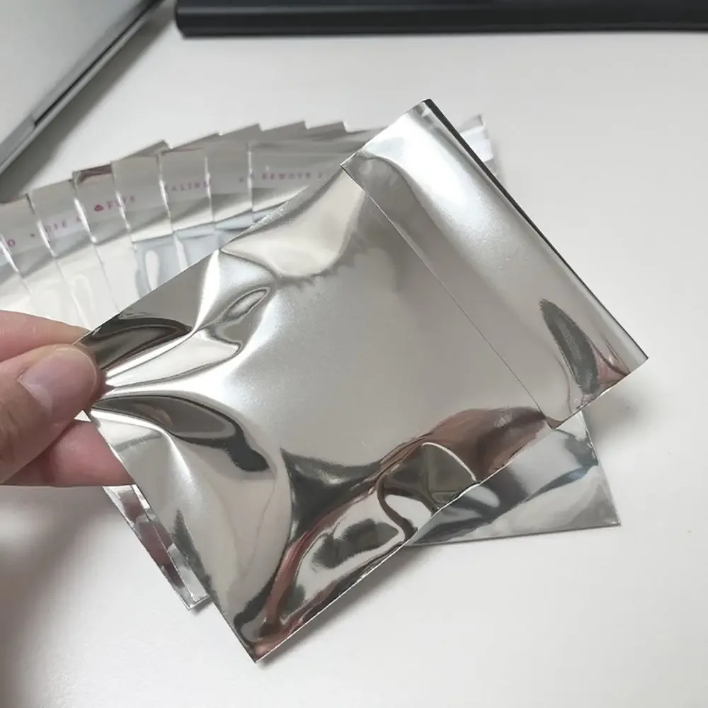 Lot de 200 sachets cadeaux auto-adhésifs en aluminium argenté, 7x9 cm - Image 1