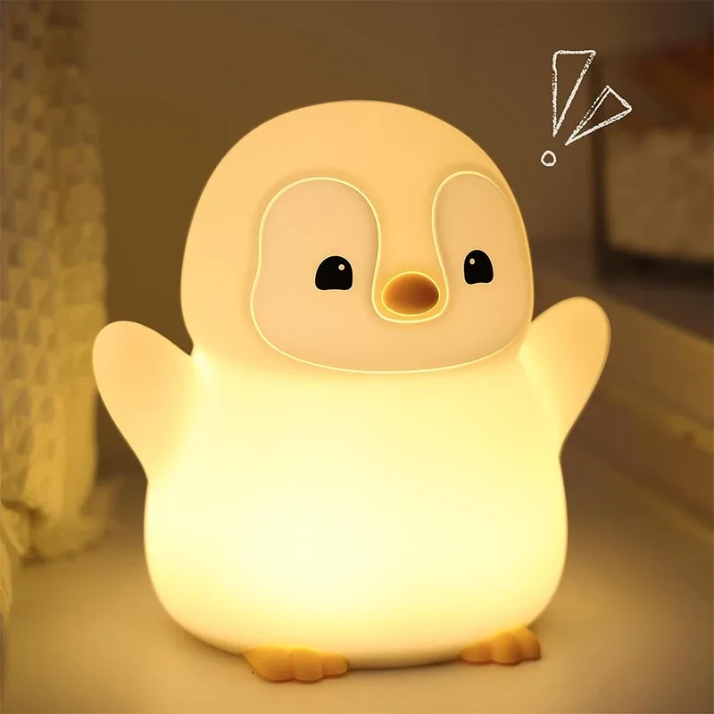 Veilleuse pingouin en silicone souple, rechargeable USB avec intensité réglable et minuterie - Image 1