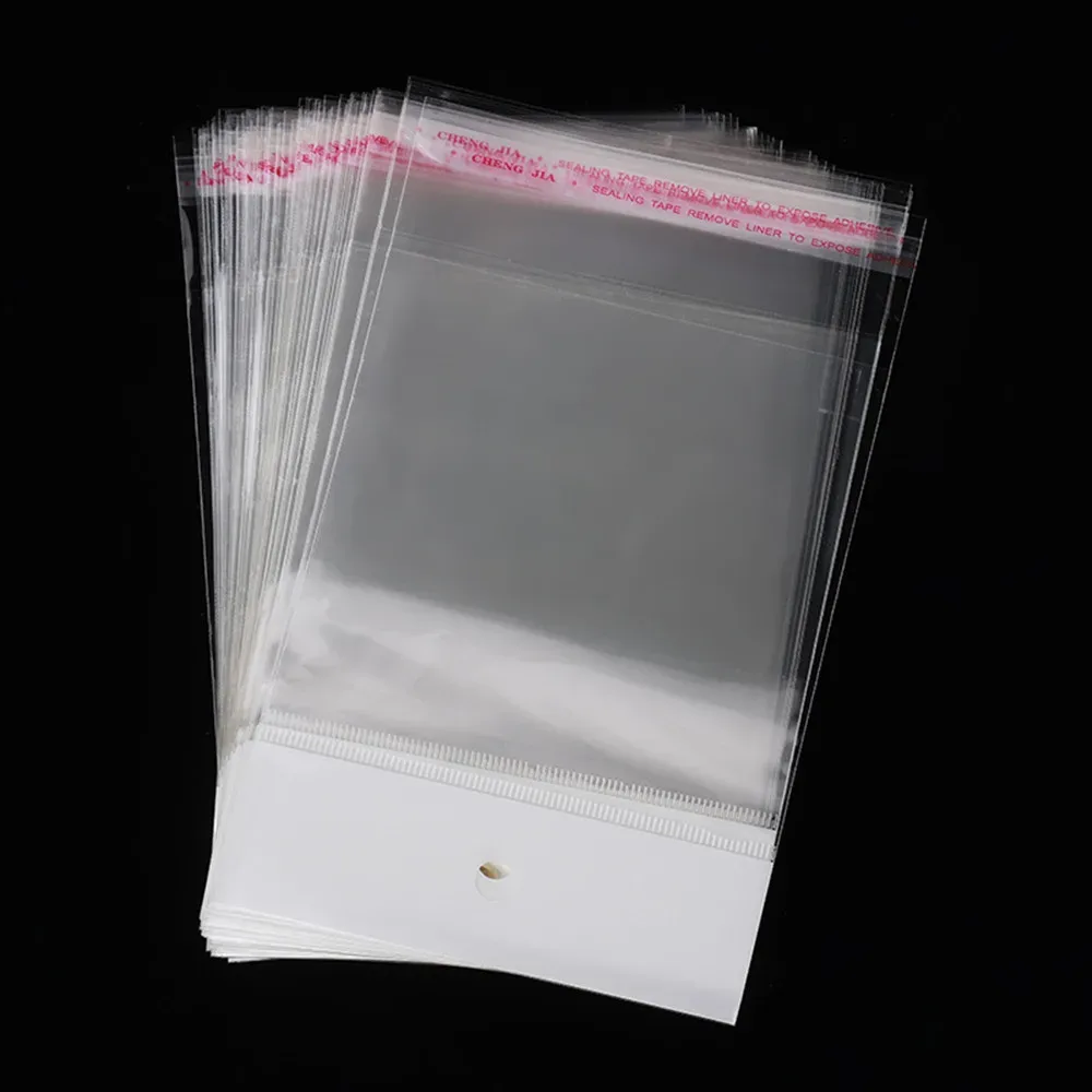 Lot de 200 sachets transparents auto-adhésifs avec support cartonné et trou de suspension