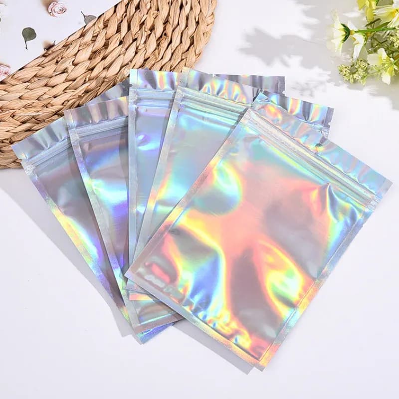 Pochettes d'emballage holographiques à fermeture zip pour bijoux et accessoires slide 2