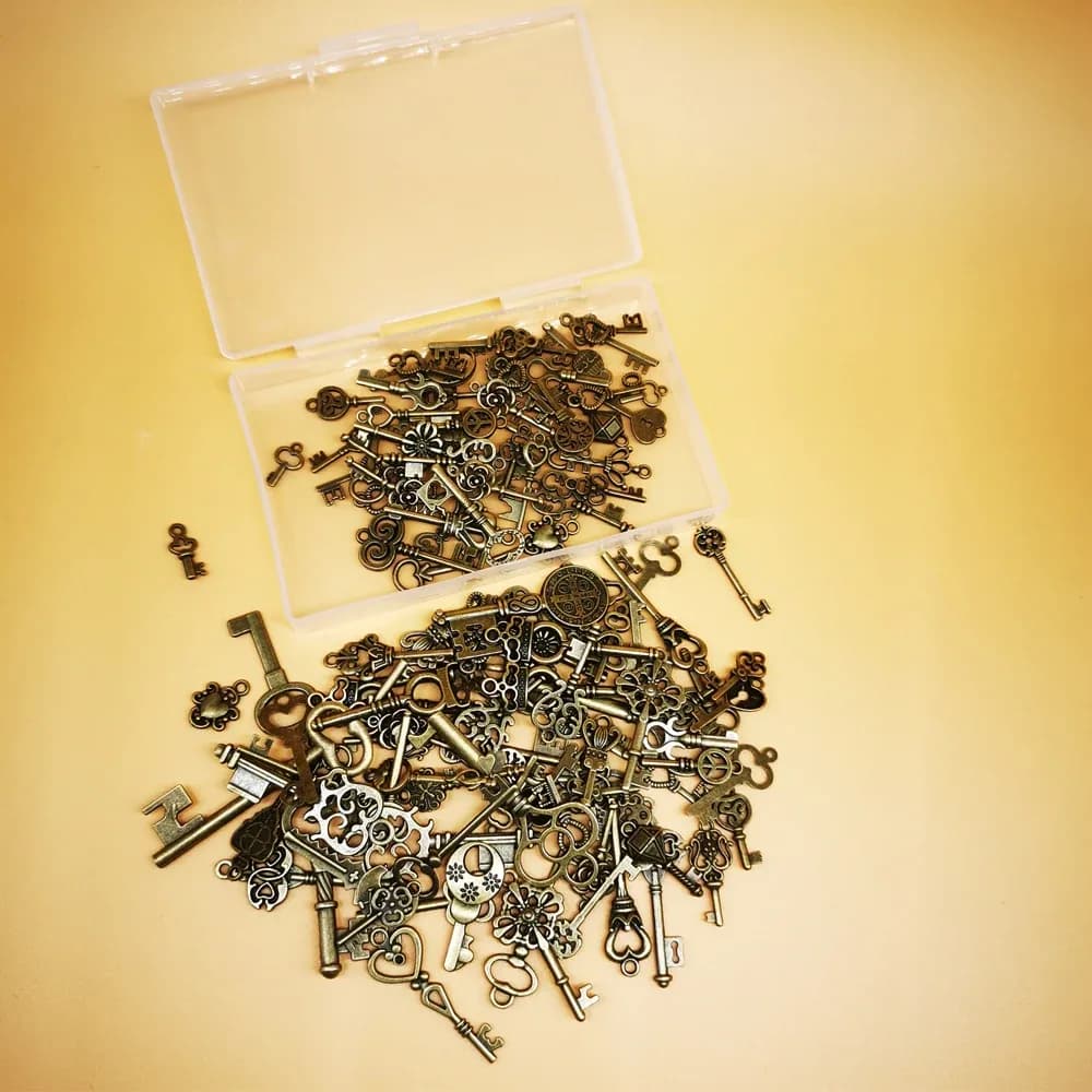 Lot de 125 clés vintage en bronze antique pour la création de bijoux slide 5
