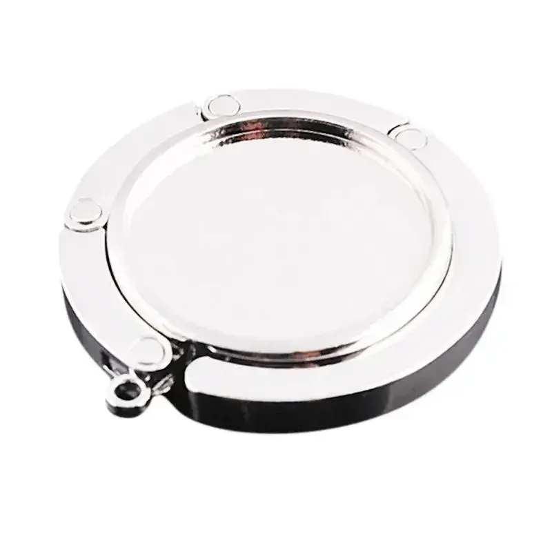 Accroche-sac pliable en cristal pour table slide 7